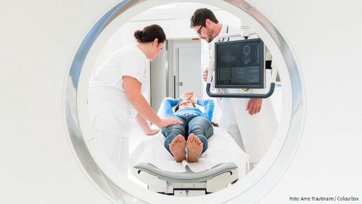 Doctor, physician, nurse, medical, specialist, radiology, radiologist, man, woman, Patient, hospital, clinic, medical team, Team, Teamwork, working, MRI, MRT, CT, computer tomography, imaging, magnetic resonance imaging, tomography, tomograph, x-ray, equipment, tube, scan, CT scan, Diagnostics, diagnose, screen, explaining, showing, care, health, healthcare, disease, medicine, people, staff, professionals, occupation, Caucasian, adult, standing, confident, white, young, competent